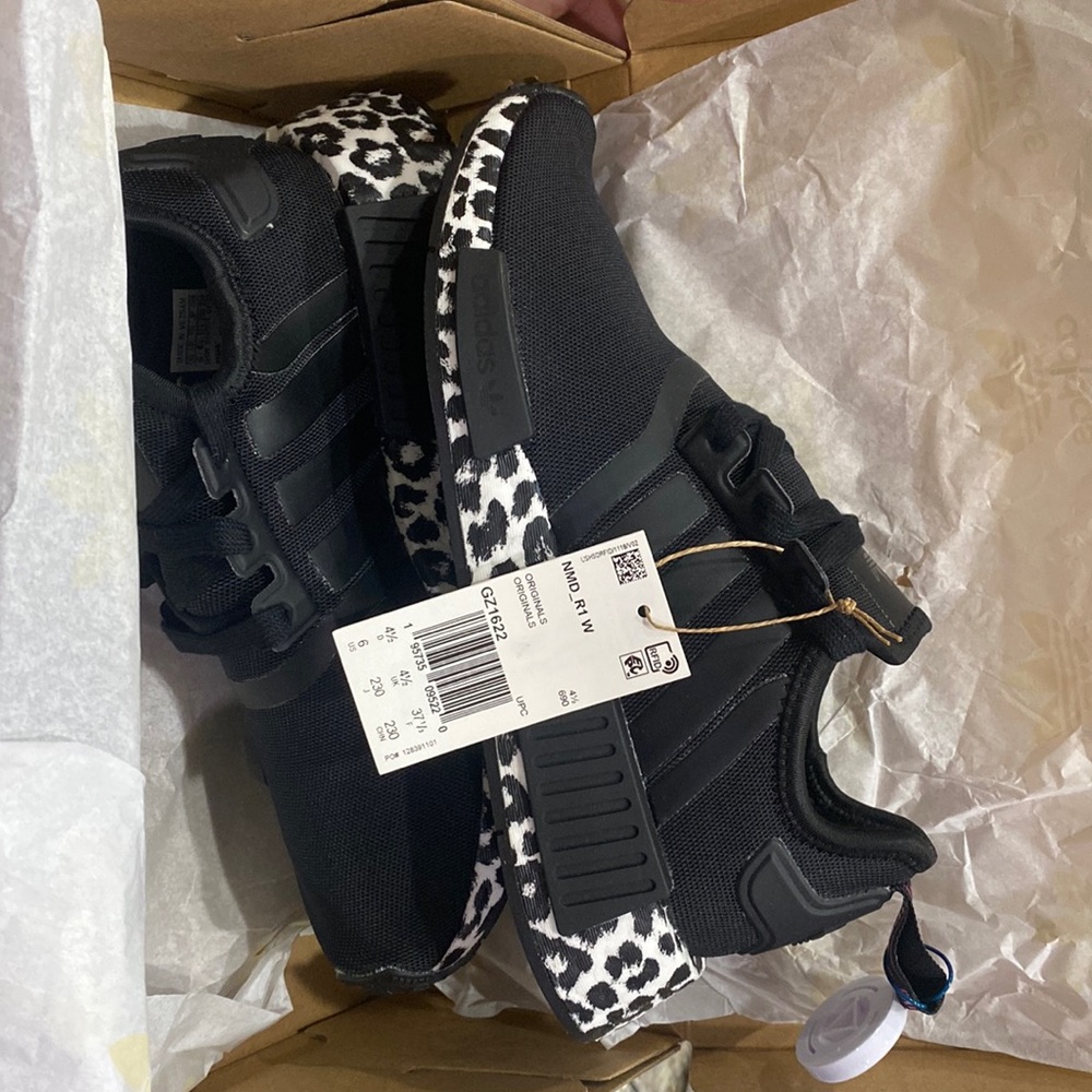 Woman’s adidas, black and white leopard print. Size US 6.